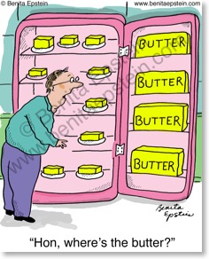 Man standing in front of a refrigerator which is filled with butter.  He says to wife: 